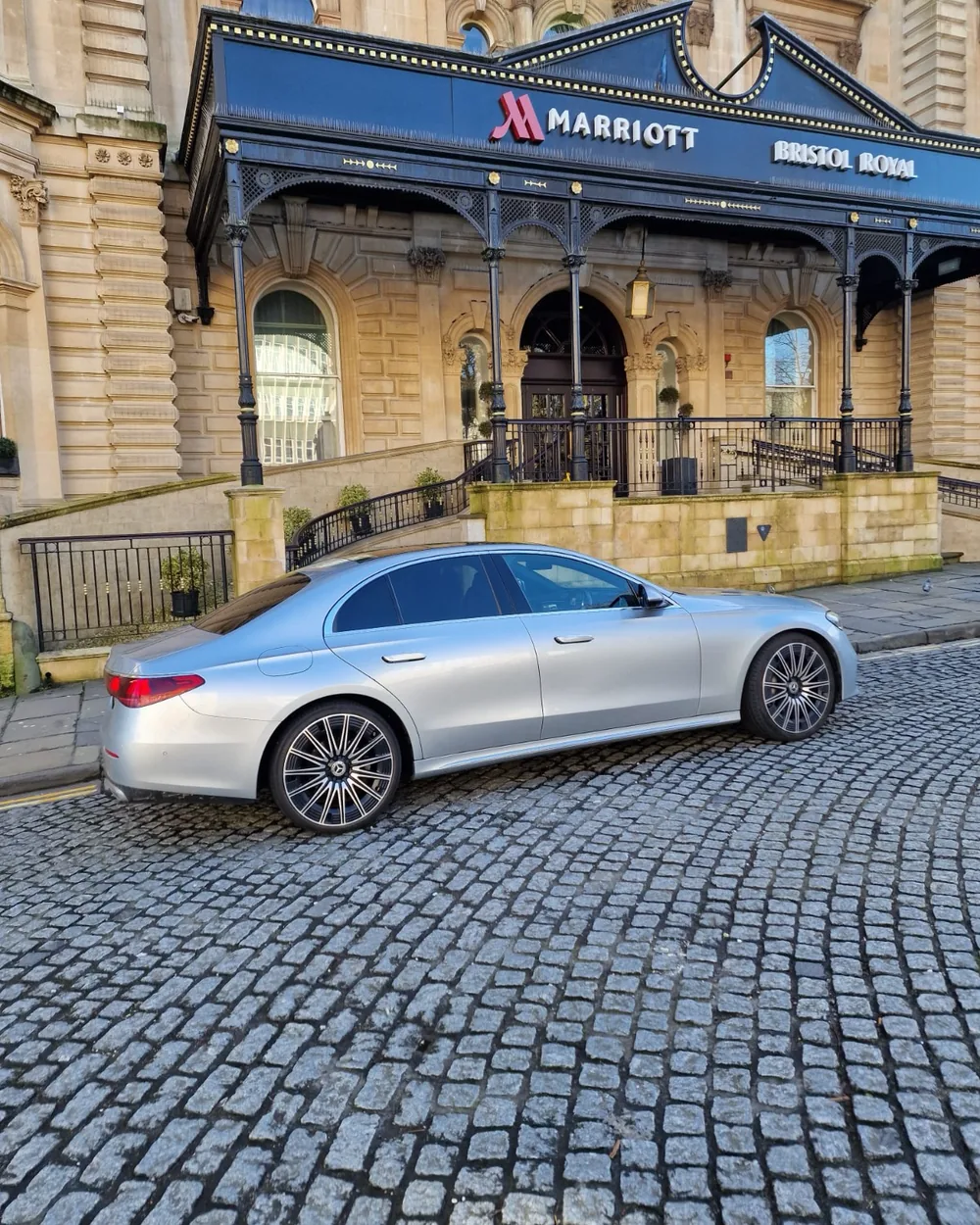Proline silver Mercedes-Benz E-Class outside the Bristol Marriott Royal hotel on a corporate chauffeur booking