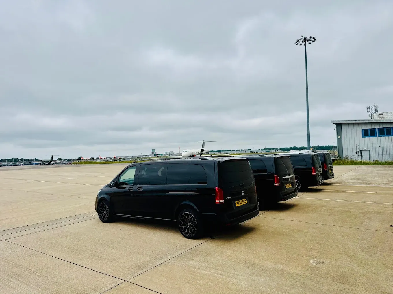 Proline vehicles parked airside for private aviation and FBO transfers
