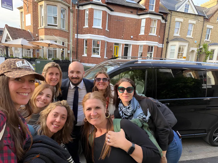 Proline Taxi owner with a group of customers in Bristol